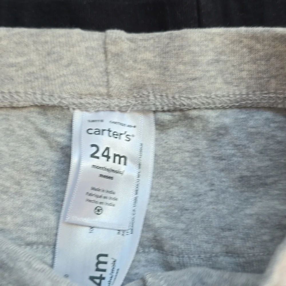 Carters Kids Ruffle Butt Leggings in Black and Gray